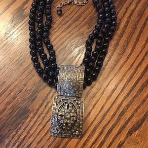 Heidi Daus Black Necklace with Ornate Pendant and Layered Beads